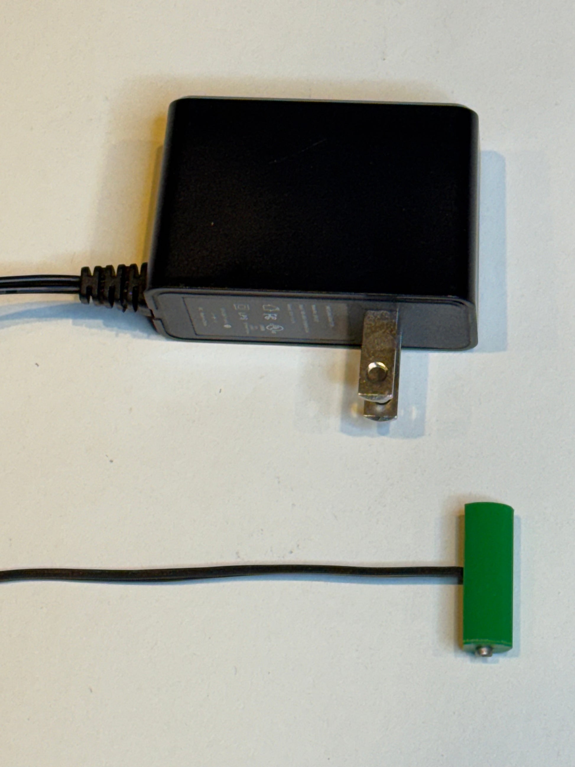 A23 Battery Eliminator - 12 Volts - AC Powered - (MN21, 23A, L1028, 8LR932) - Battery Eliminator Store - Battery Replacement, aa battery to ac power, aaa to ac power, dc power, battery to usb, 9 volt battery to ac power, ac power adapter, 2 aa to ac power, 4 aa to ac power, 3 aaa to ac power, 9v to ac power, ac power supply adapter, cr123a, dummy cell, active cell, battery eliminator, replace battery, eliminate battery, remove battery, convert aa to ac power, 6 aa battery, 2 aa battery, 4 aa battery, 9 volt